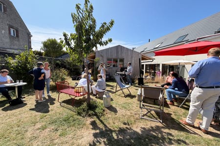 Family gathering in the garden on a summer afternoon